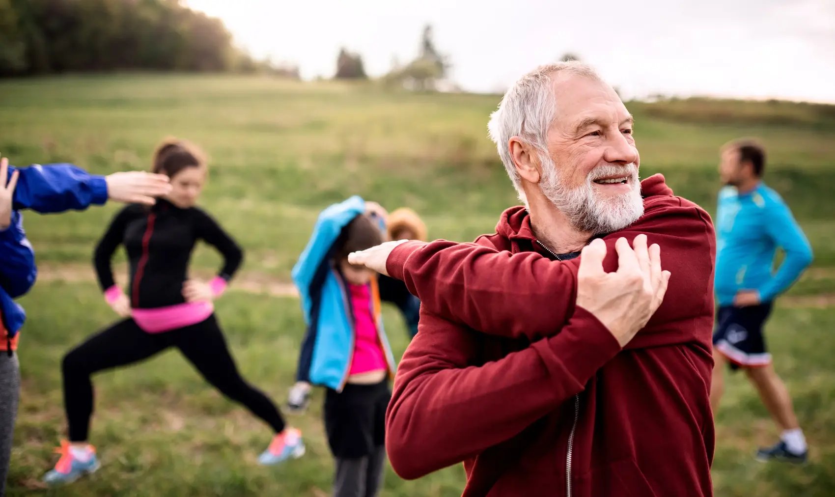 active people doing exercise in nature