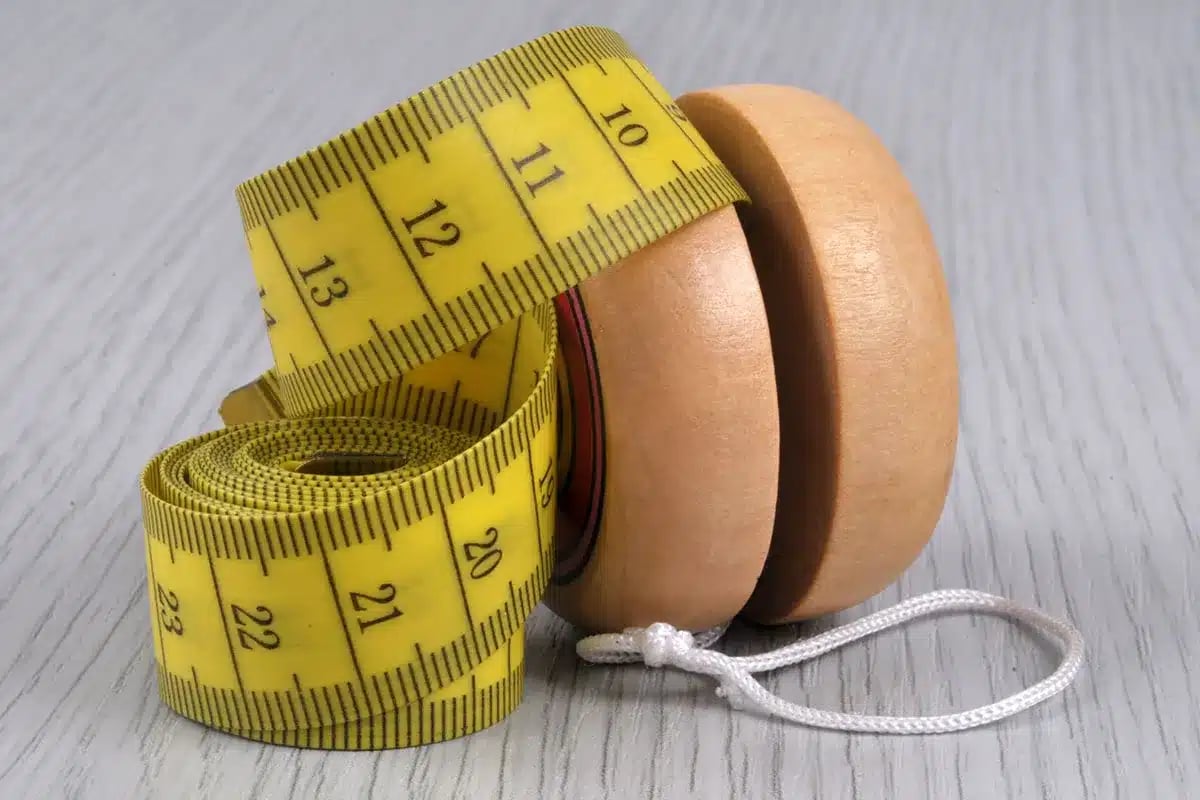 Measuring tape and yo-yo.