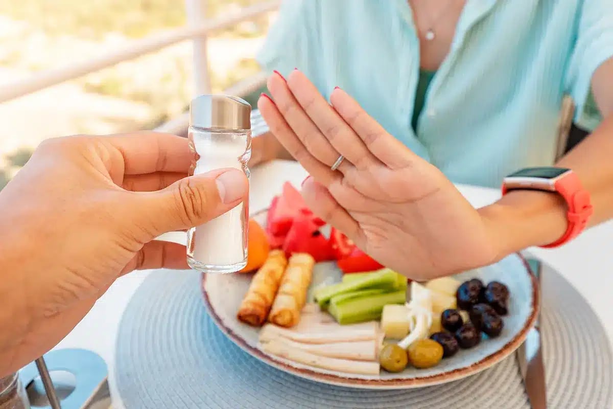 Woman refusing salt.