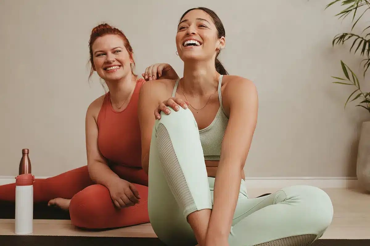 Women relaxing after workout.