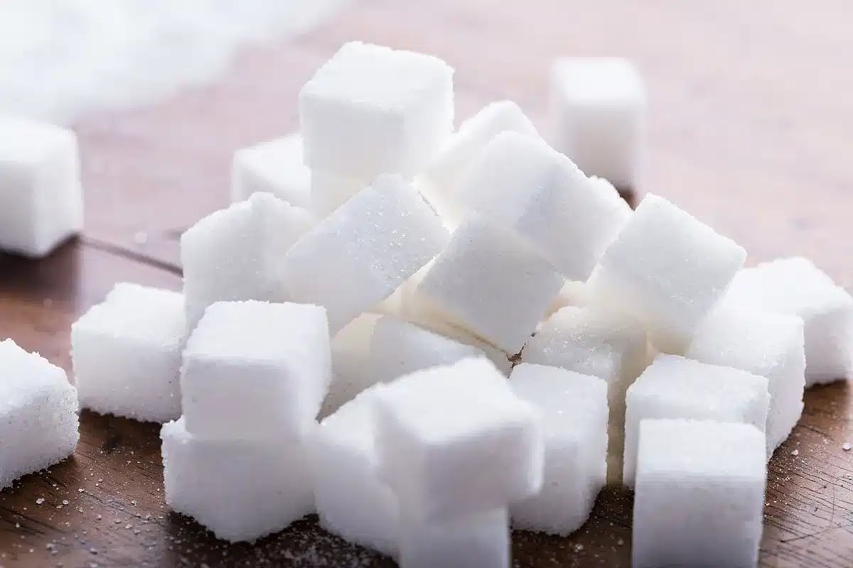 Pile of white sugar cubes.