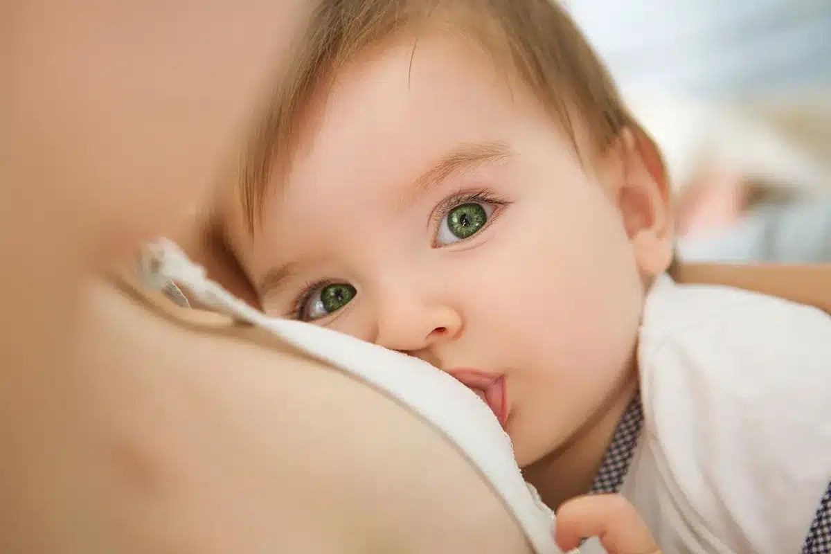 Baby breastfeeding from mother.