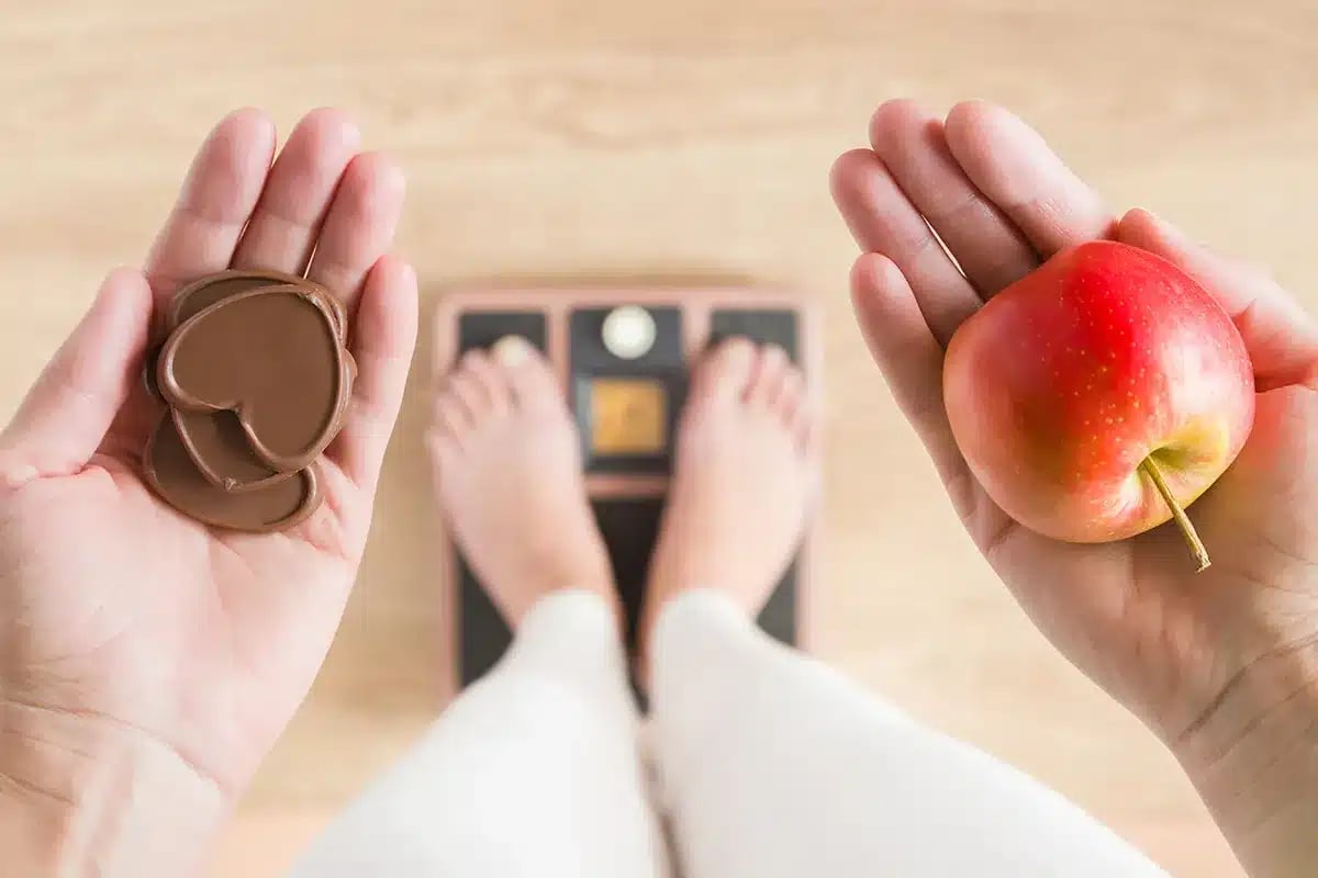 Choosing between chocolate and apple.