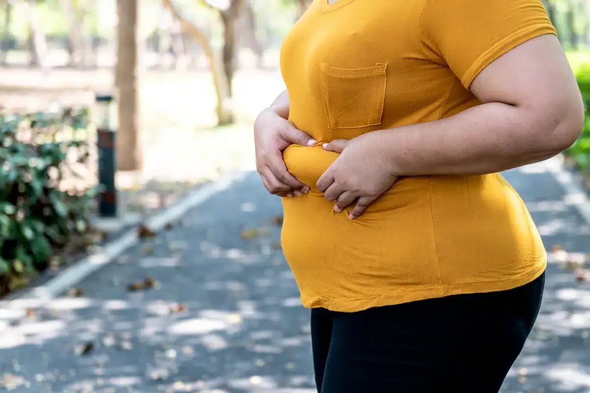 Person with excess belly fat.
