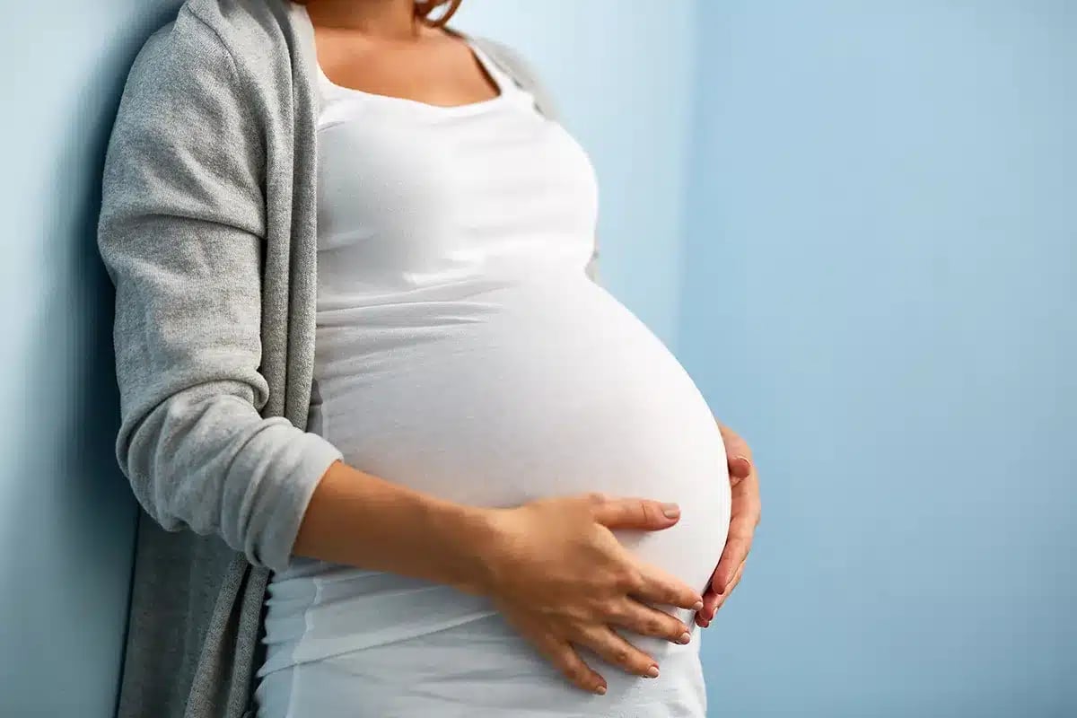 close up of a pregnant woman's belly